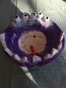 Handmade Bowl has a multiple eyes and sharp teeth on rim, a "tongue" inside making look the bowl like a "Monster's" mouth